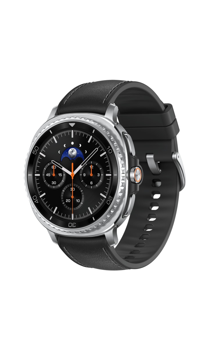 Samsung Galaxy Watch8 Classic with a black leather strap, displaying an analog watch face featuring multiple sub-dials and a moon phase indicator, shown at a right angle.