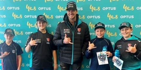 Chaz Mostert with St Thomas More's Catholic School Students